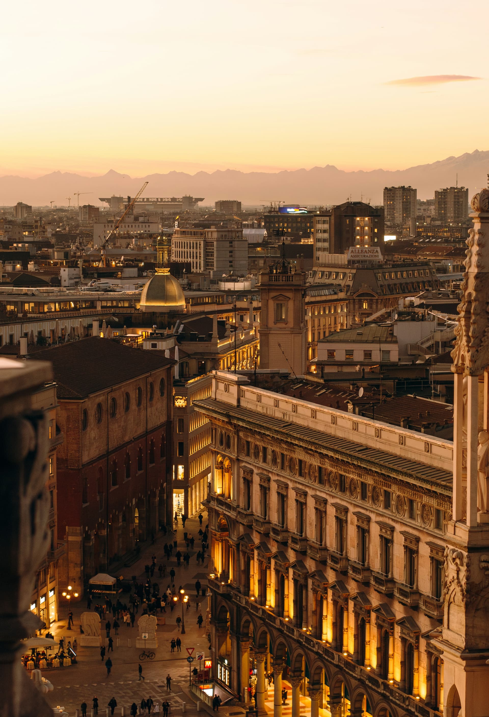 Panoramic view from Duomo Terraces. Sunset of Milan. Golden hour.