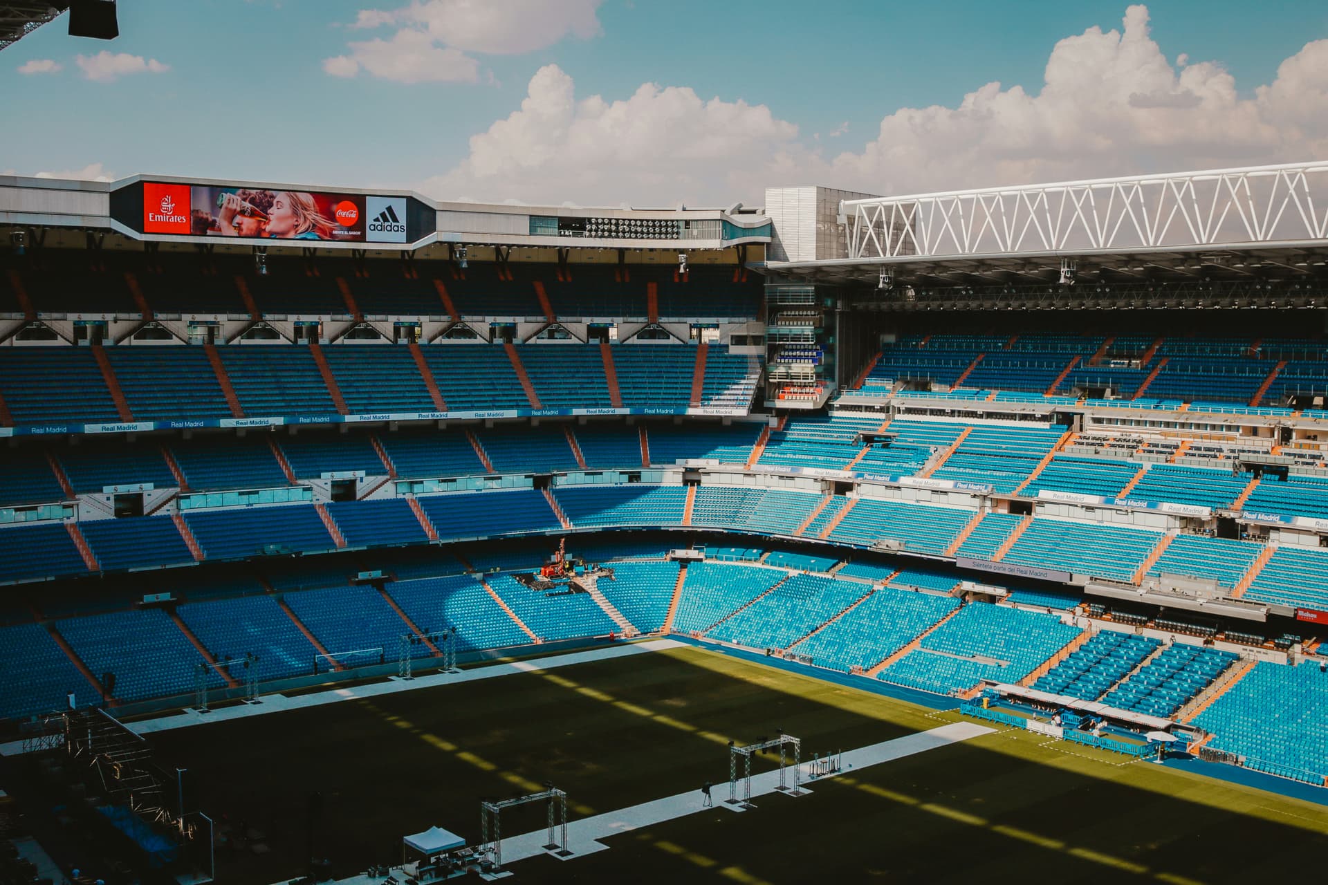 stadium with no people under blue and white skies
