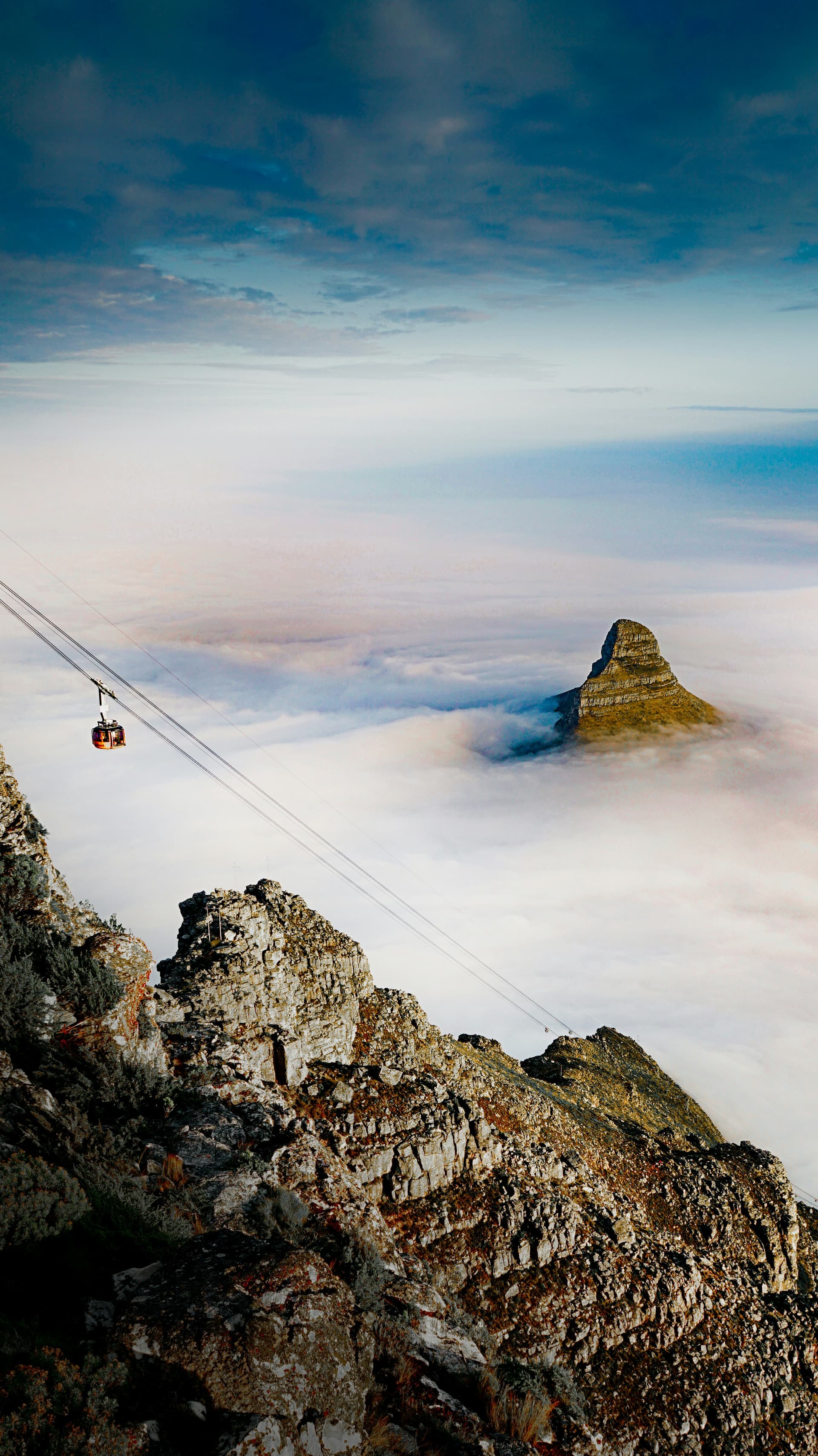 @thomasbennie_ (instagram)
sunrise overlooking lions head covered with clouds taken from table mountain